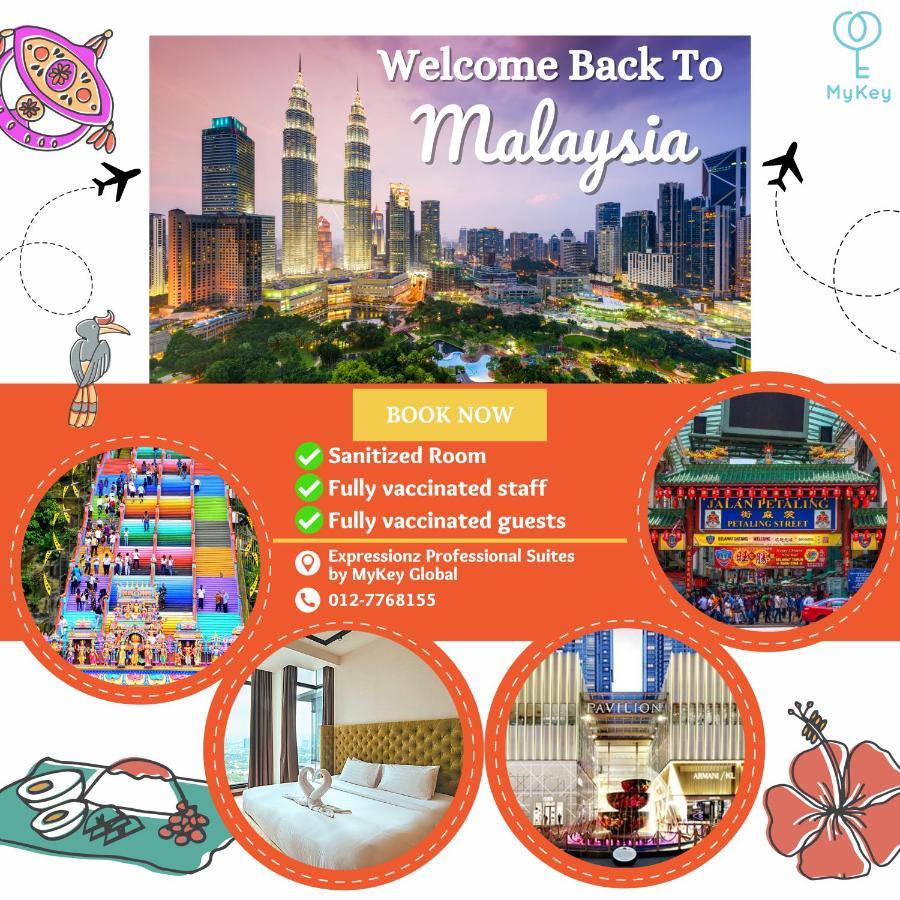 Expressionz Professional Suites By Mykey Kuala Lumpur Zewnętrze zdjęcie A poster advertising the reopening of Malaysia's borders to tourists.