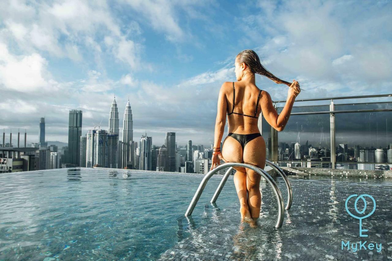 Expressionz Professional Suites By Mykey Kuala Lumpur Zewnętrze zdjęcie A woman wearing a thong bikini